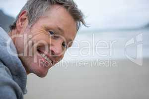 Close-up of happy man on beach