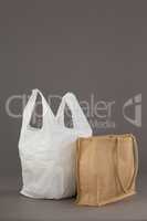 Beige fabric bag and white plastic bag