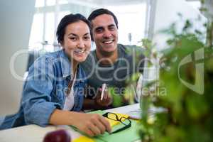 Graphic designers working at desk