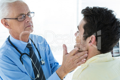 Doctor examining patient jaw