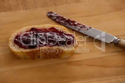 Bread with jam and knife