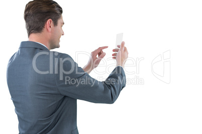 Businessman using futuristic mobile phone