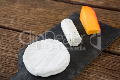 Variety of cheese on slate plate