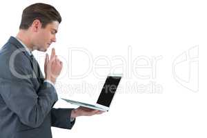 Businessman using laptop