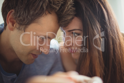 Romantic couple relaxing on bed