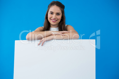 Woman holding a blank placard