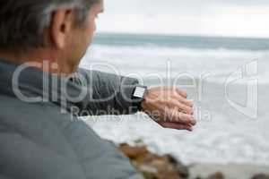 Man checking the time on smartwatch