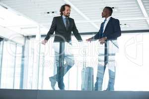 Businessman talking with colleague