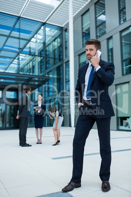 Businessman talking on mobile phone