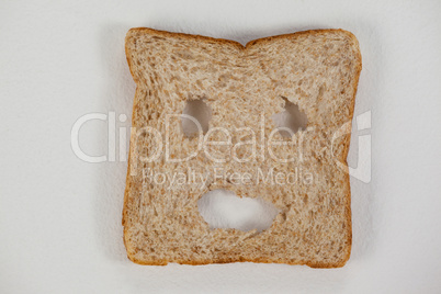 Smiley face on bread slice