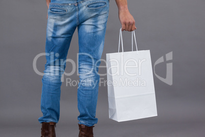 Man holding shopping bag