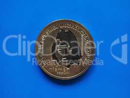 Two Polish Zloty coin, Poland over blue