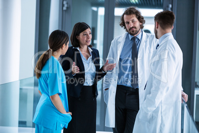 Businesswoman interacting with doctors