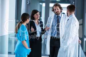 Businesswoman interacting with doctors