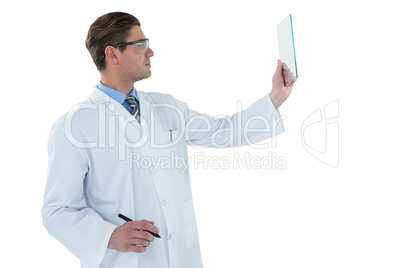 Doctor pretending to be using futuristic digital screen