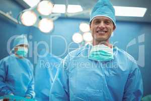 Portrait of male surgeon smiling in operation theater