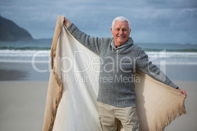 Senior man enjoying on beach