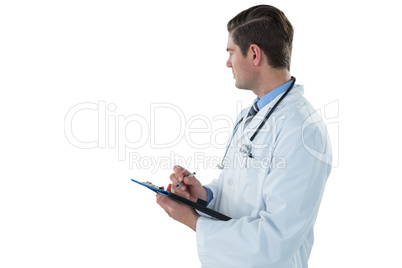 Doctor writing with pen on clipboard