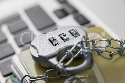 Smart cards locked in chain on laptop