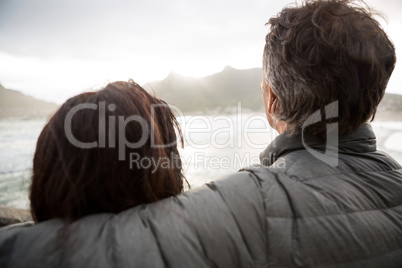 Romantic couple embracing each other on beach