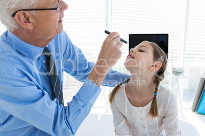 Doctor examining patient eye