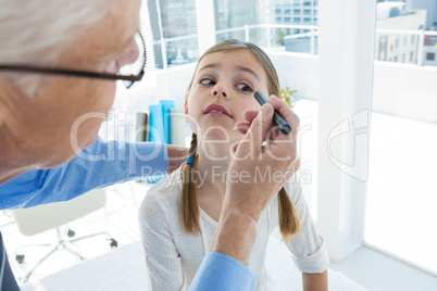 Doctor examining patient eye