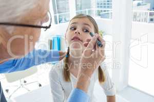 Doctor examining patient eye