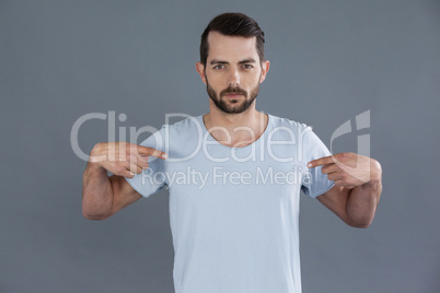 Portrait of man posing in grey t-shirt