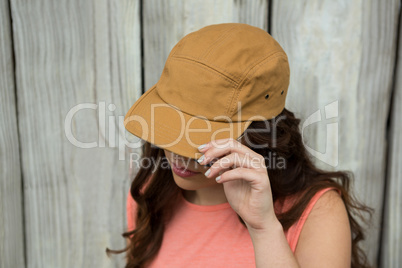 Woman in brown cap