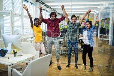 Team of business executives with holding hands