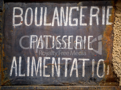 Schild Bäckerei, Lebensmittelhandlung in französischer Sprache