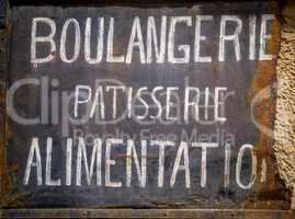 Schild Bäckerei, Lebensmittelhandlung in französischer Sprache