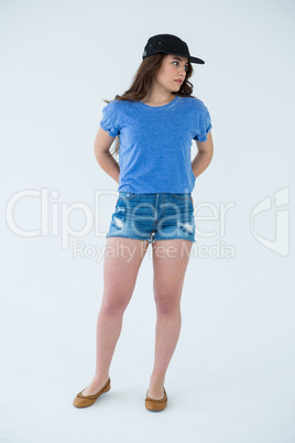 Beautiful woman in blue top and cap