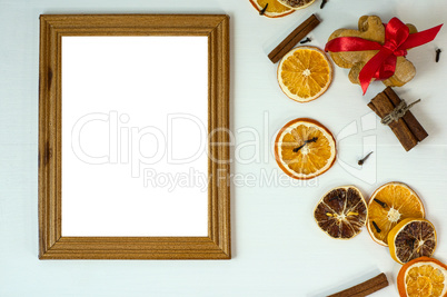 Empty wooden photo frame on white wooden surface