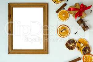 Empty wooden photo frame on white wooden surface