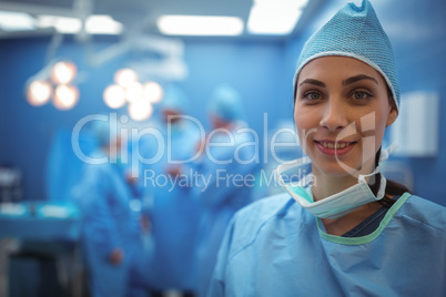 Portrait of female surgeon smiling in operation theater