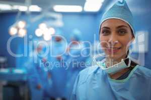 Portrait of female surgeon smiling in operation theater