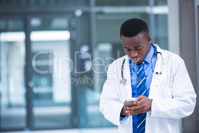 Doctor using mobile phone