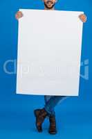 Man holding a blank placard