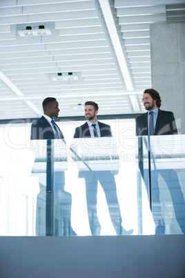 Businessman talking with colleague