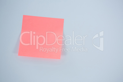 Close-up of pink adhesive note