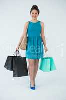 Beautiful woman carrying shopping bags