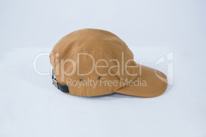 Brown cap on white background