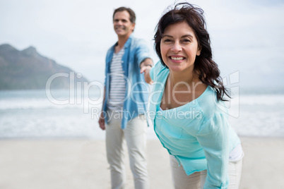 Couple enjoying on beach