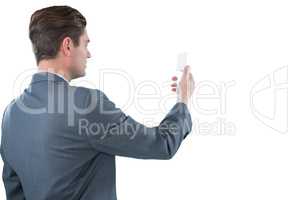 Businessman using futuristic mobile phone