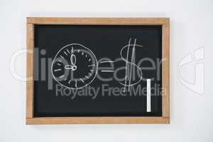 Clock and dollar sign drawn on slate