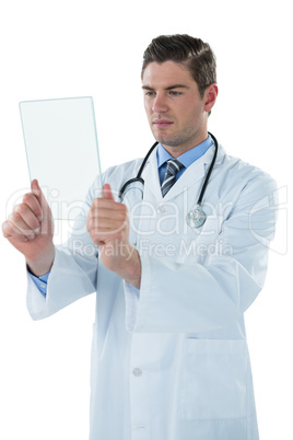 Male doctor using an futuristic digital tablet