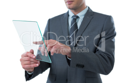 Businessman using futuristic digital tablet