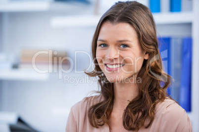 Beautiful woman smiling in clinic