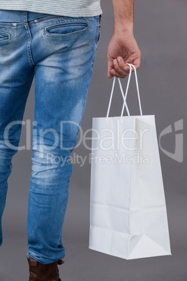 Man holding shopping bag